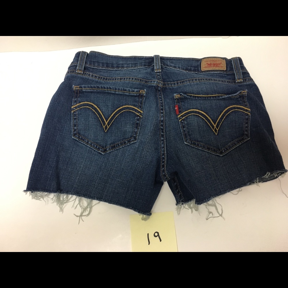 Levi’s 524 cut off jeans raw hem